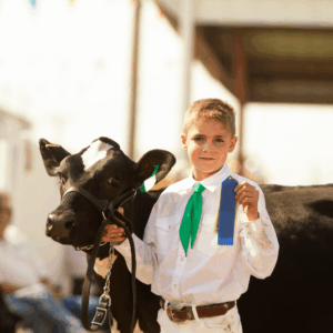 The Role of Proper Nutrition in Show Animal Success played a huge part in the ribbons this show ring winner is holding.